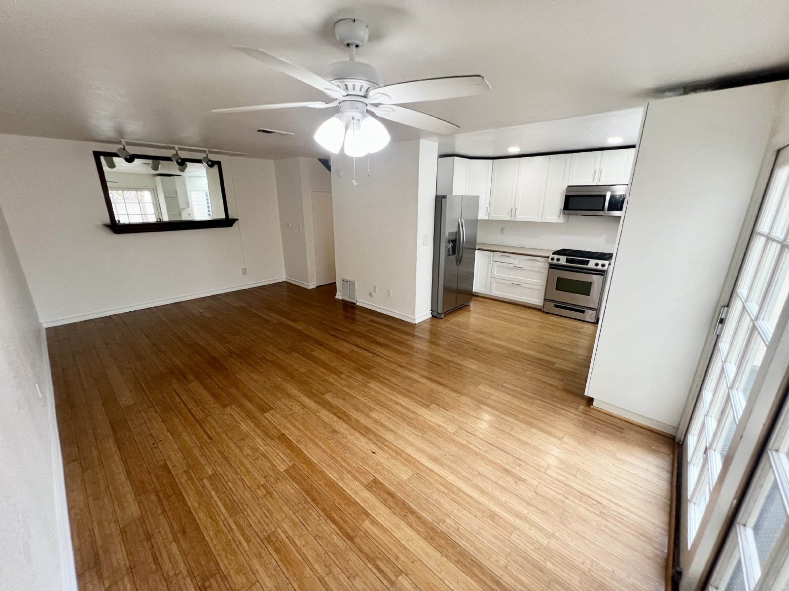 Stunning 4BR Townhome with Hardwood Floors, Private Patio, Community Pool & 2-Car Garage! property image