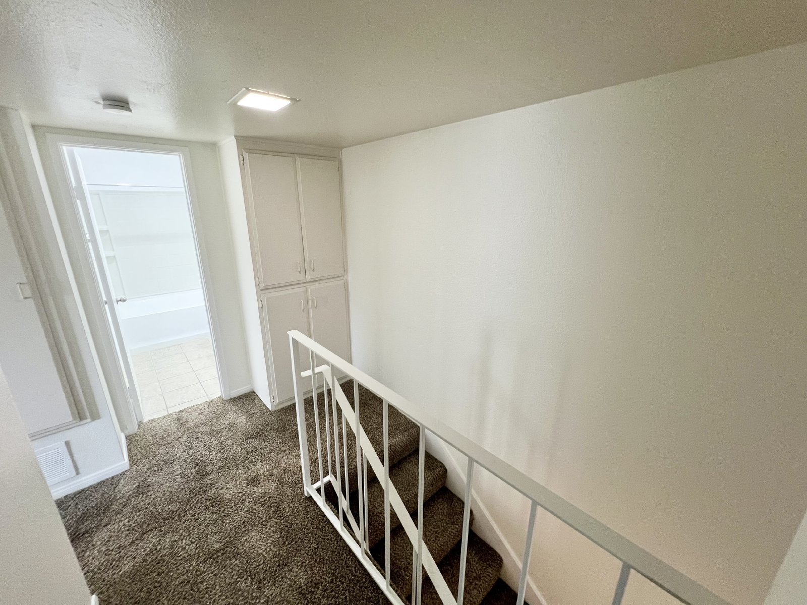 Stunning 4BR Townhome with Hardwood Floors, Private Patio, Community Pool & 2-Car Garage! property image