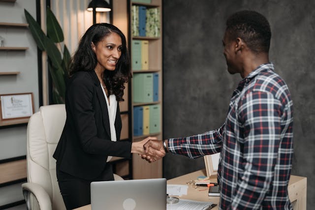 two people shaking hands
