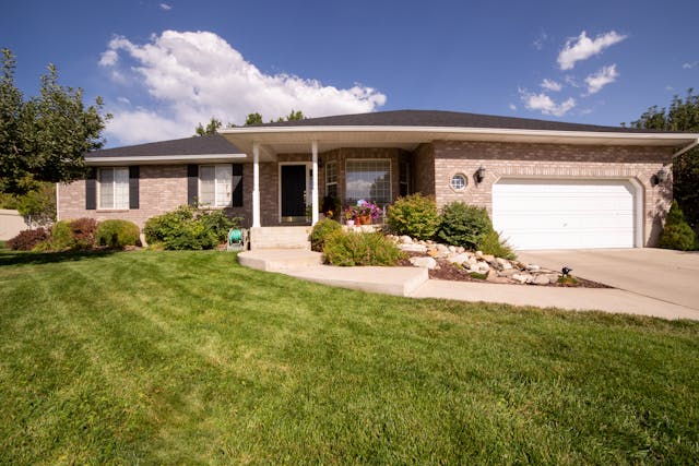 Brick house with a curved walkway